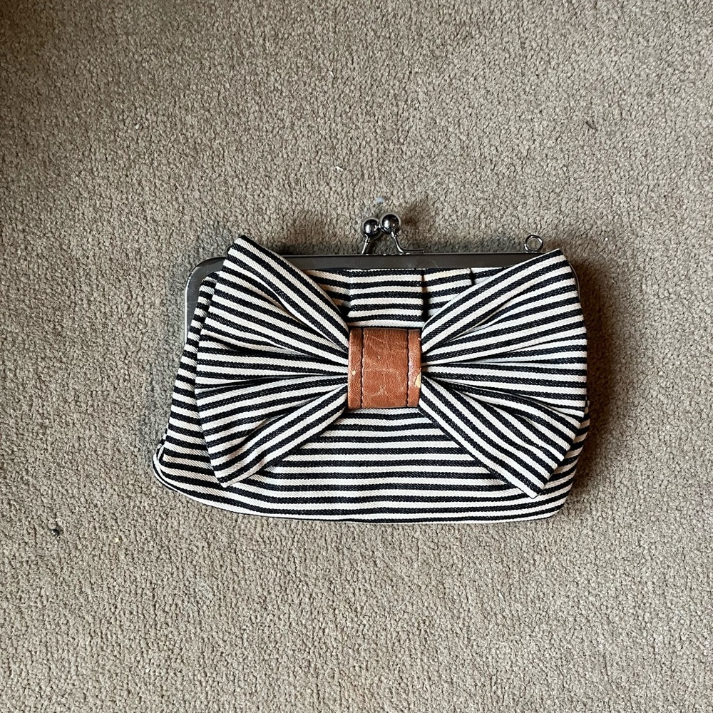 Striped clutch with bow